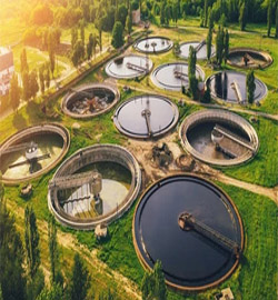Aerial view of circular sewage treatment tanks, constructed by RES Group for sustainable eco-friendly systems