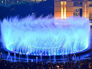 A dazzling blue jet fountain, constructed and designed by RES Group, captivating crowds with innovative design.