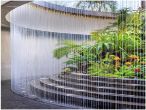 A serene string water curtain fountain, created by RES Group, enhancing gardens with elegant water flow
