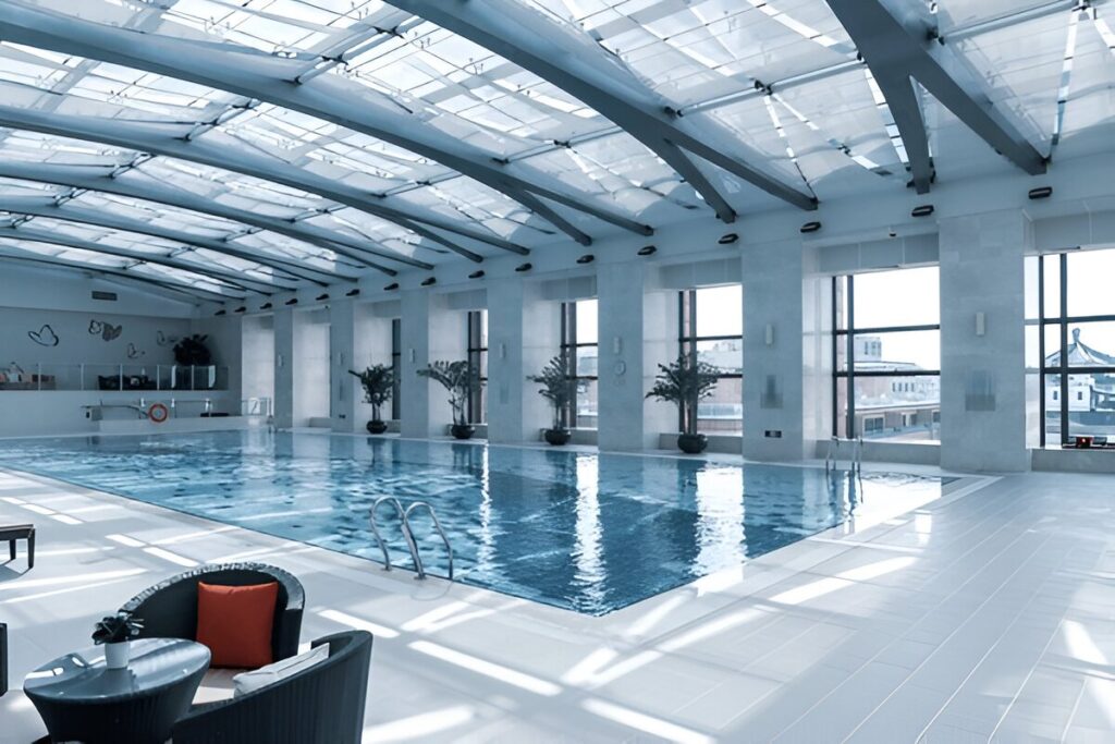 An inviting indoor pool with spa elements for year-round use.