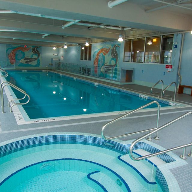 An inviting indoor pool with spa elements for year-round use.