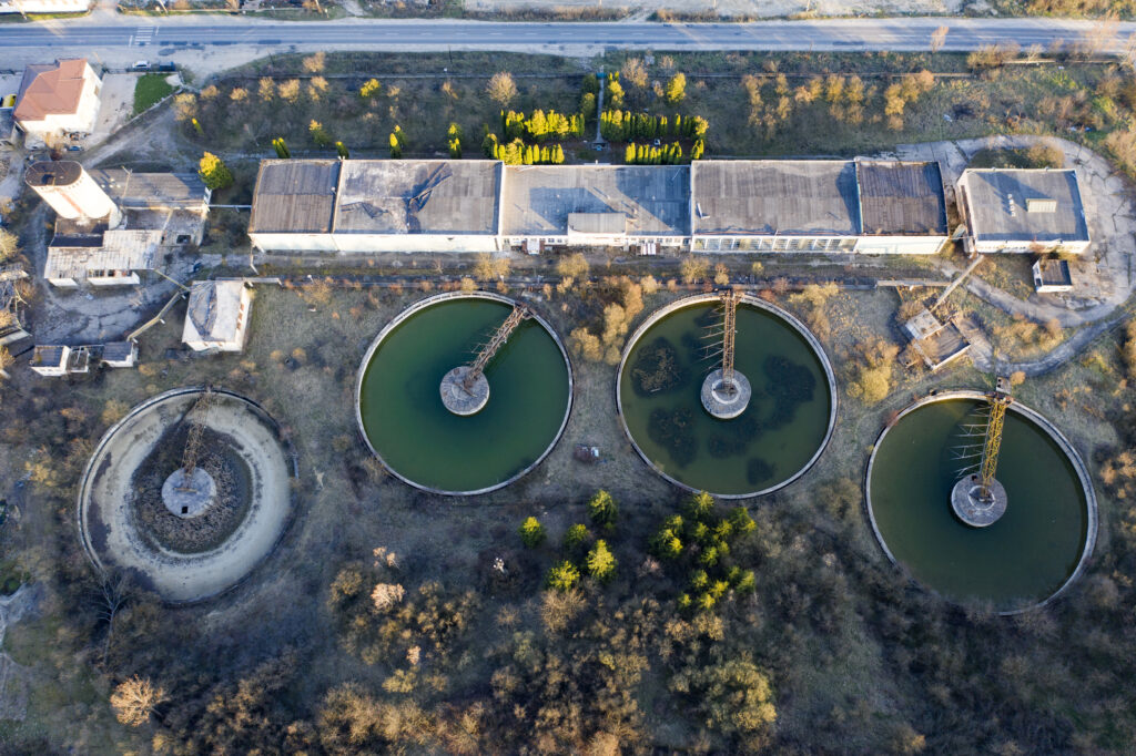 Aerial view of territory of abandoned industrial area. Exclusion zone, radiation risk, lost city, apocalyptic building.