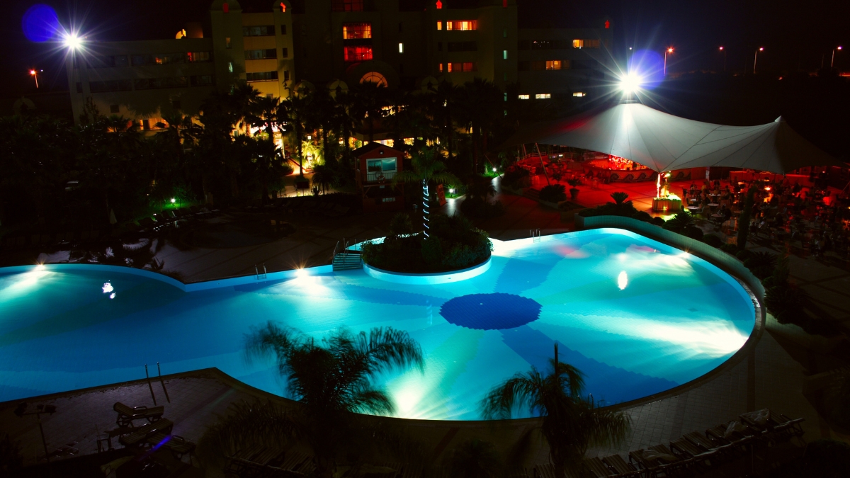 Color-changing LED underwater lights illuminating a modern swimming pool in Kolkata with vibrant RGB lighting effects